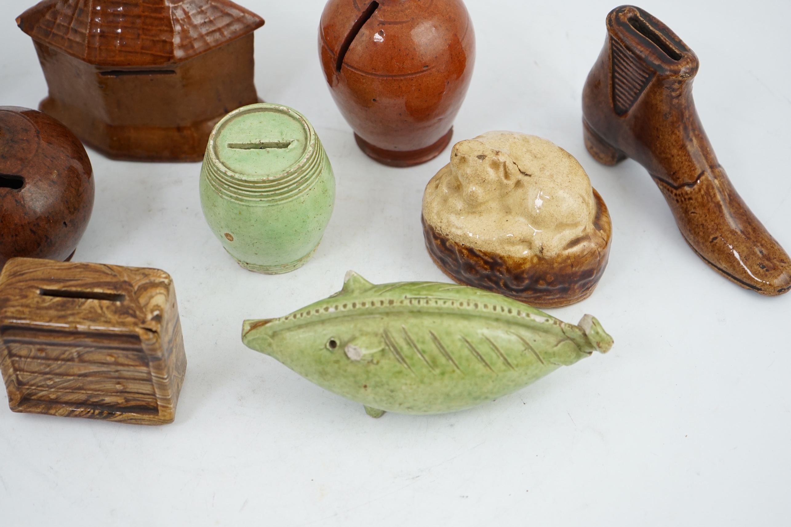 A collection of ten 19th century Dutch and British pottery money boxes